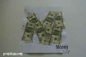 I found this tissue paper at the Goodwill. You could use play money. Kids painted the glue then stuck the money on.
