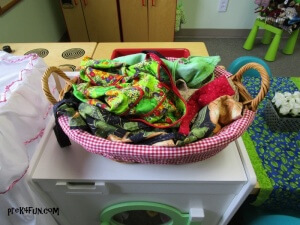 I added a basket full of Aprons to our house play.